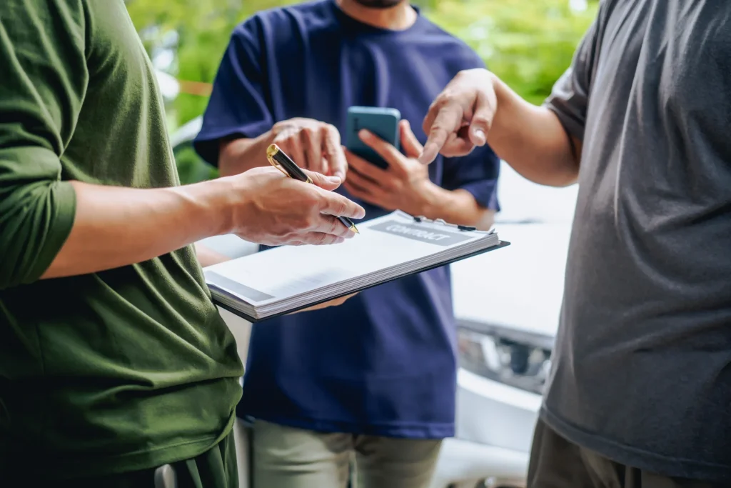 asian-clients-engage-with-a-car-insurance-agent-be-2025-02-15-13-44-52-utc asian-clients-engage-with-a-car-insurance-agent-be-2025-02-15-13-44-52-utc